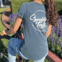 Load image into Gallery viewer, This stunning stone-washed ladies tee is made from 100% combed cotton, ultra-comfortable, hand-dyed, making each tee unique. It combines premium quality with environmental consciousness. Its design features include a curved hem and rolled sleeves.